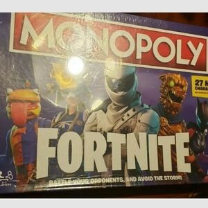 MONOPOLY Fortnite Edition Board Game. New sealed but damage to box as is